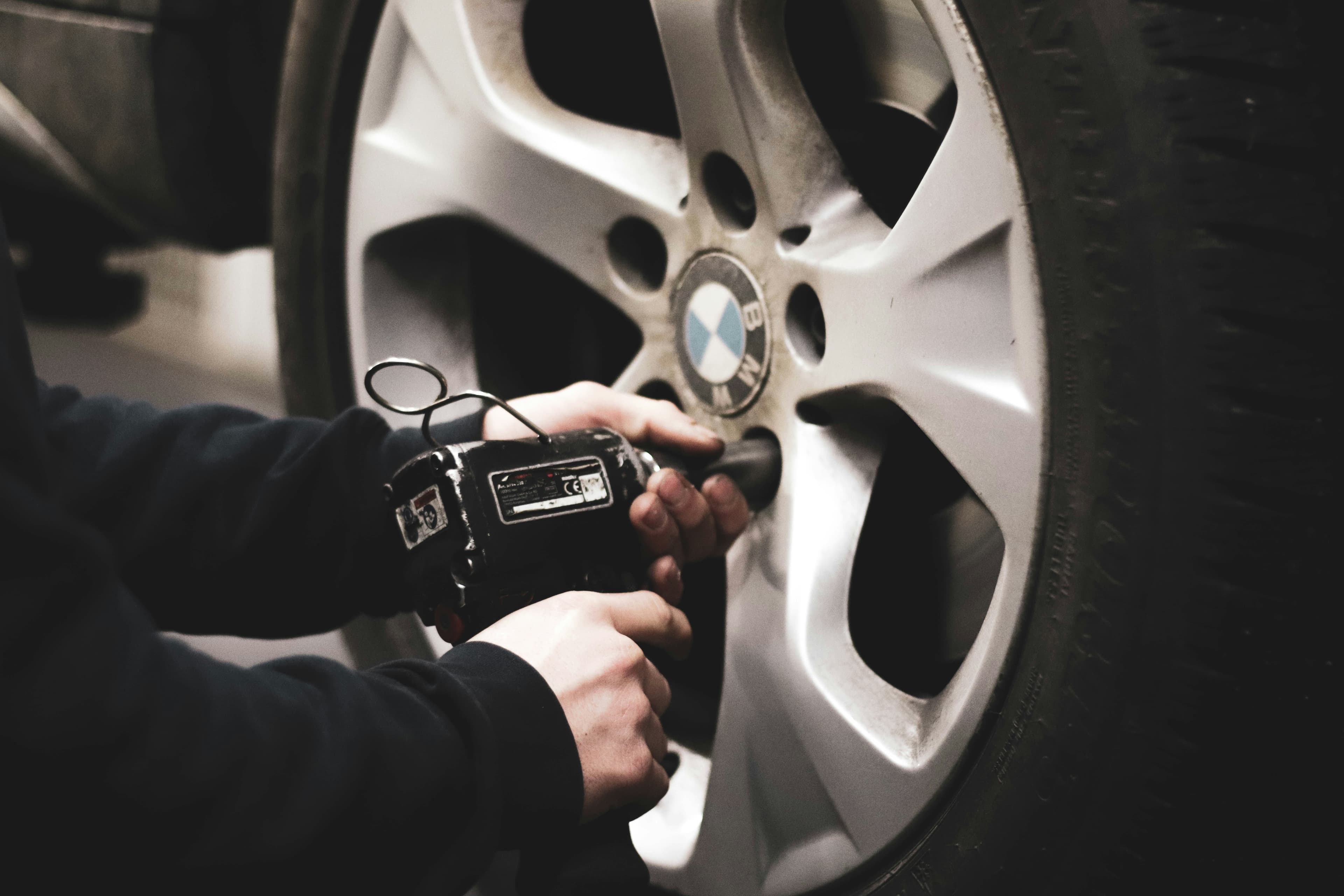 Tire being mounted in auto shop